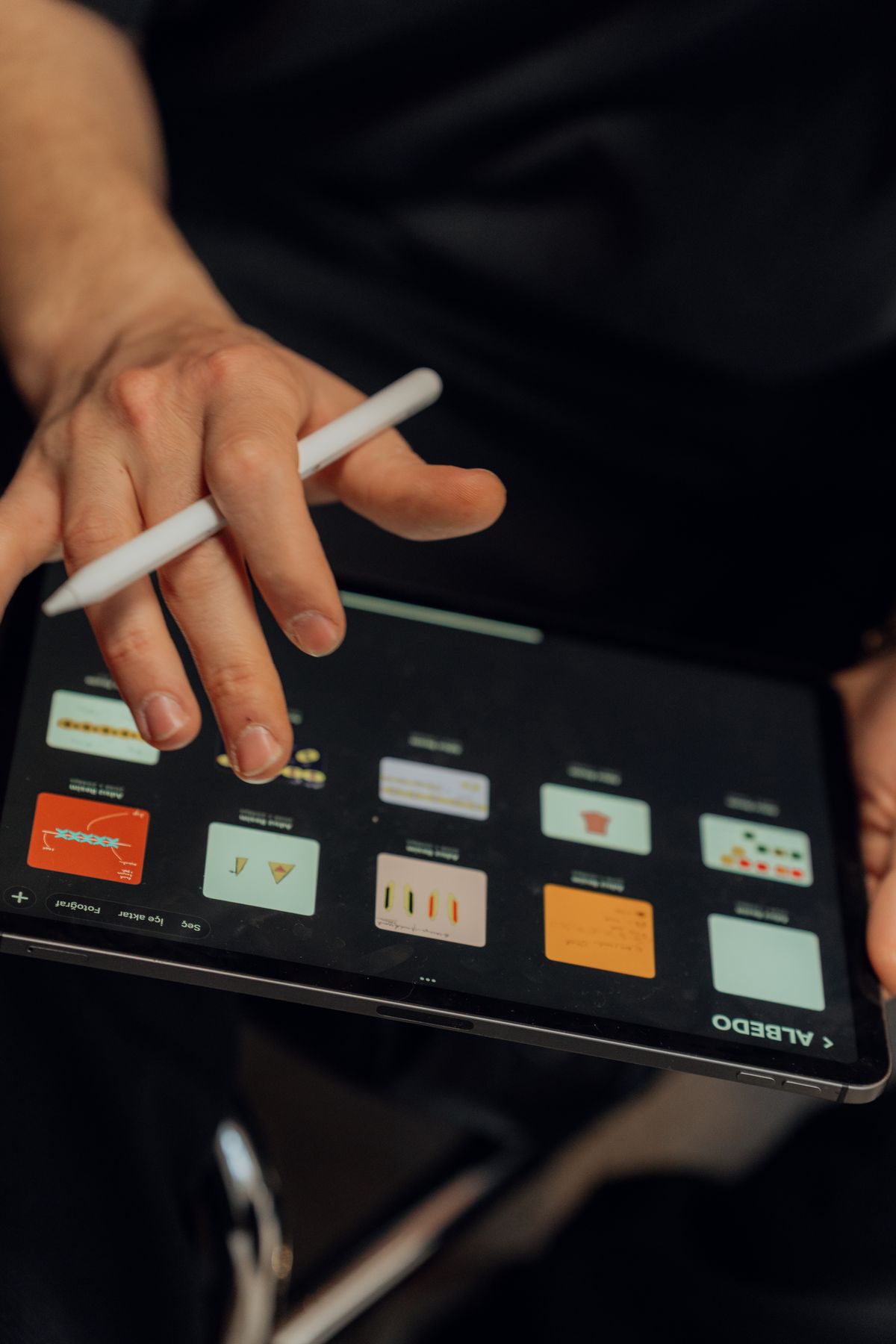 Designer using a stylus and digital tablet